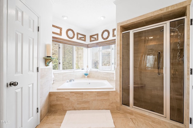 full bath featuring ornamental molding, a stall shower, tile patterned floors, and a bath