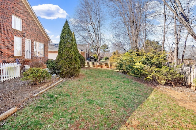 view of yard featuring fence