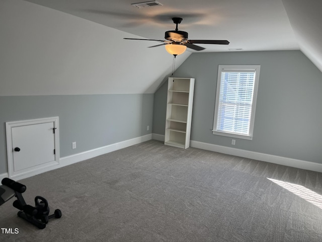 bonus room featuring visible vents, baseboards, lofted ceiling, ceiling fan, and carpet