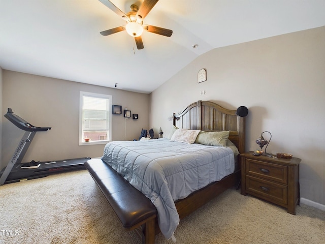 bedroom featuring a ceiling fan, light colored carpet, and vaulted ceiling