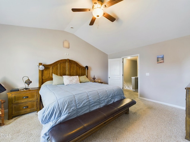 bedroom with lofted ceiling, baseboards, a ceiling fan, and light colored carpet