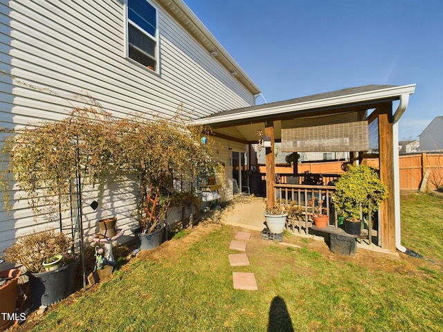 view of yard featuring a patio area and fence