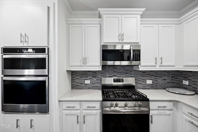 5520 Advancing Ave, Raleigh, NC 27616 - kitchen with appliances with stainless steel finishes, white cabinetry, backsplash, light stone counters, and ornamental molding