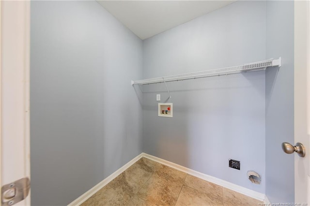 laundry area featuring laundry area, washer hookup, electric dryer hookup, and baseboards