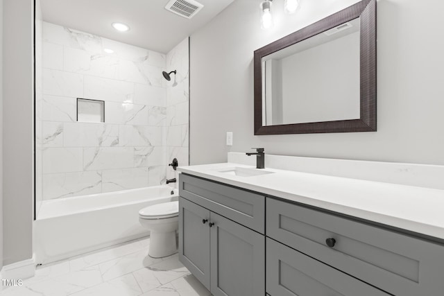 full bathroom featuring toilet, vanity, visible vents, marble finish floor, and  shower combination