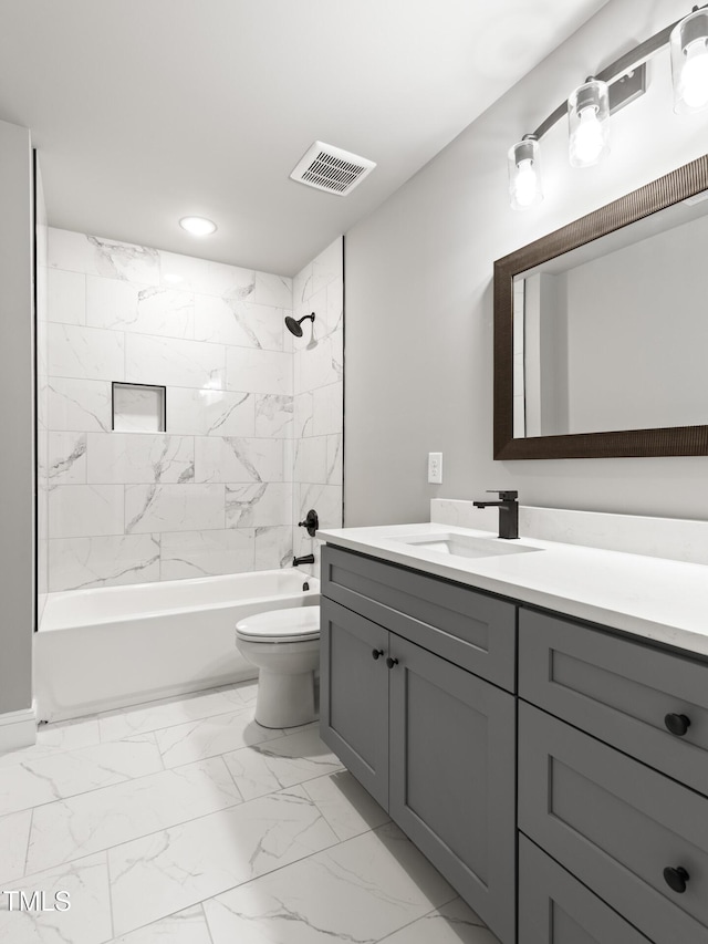 bathroom with toilet, bathing tub / shower combination, vanity, visible vents, and marble finish floor