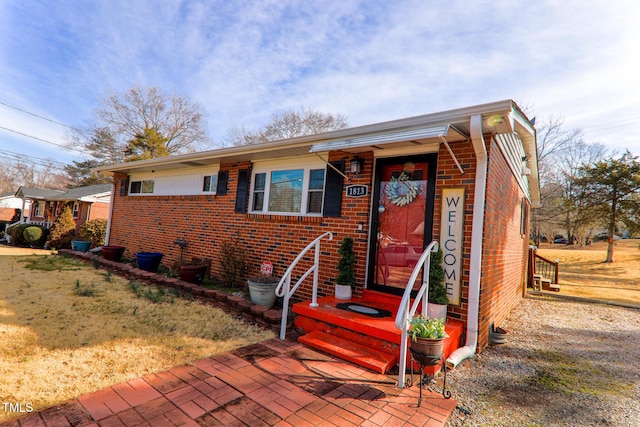 view of front of property featuring brick siding