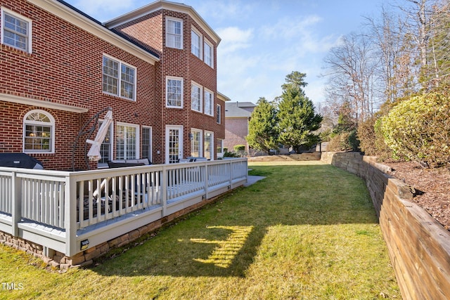 view of yard featuring a deck