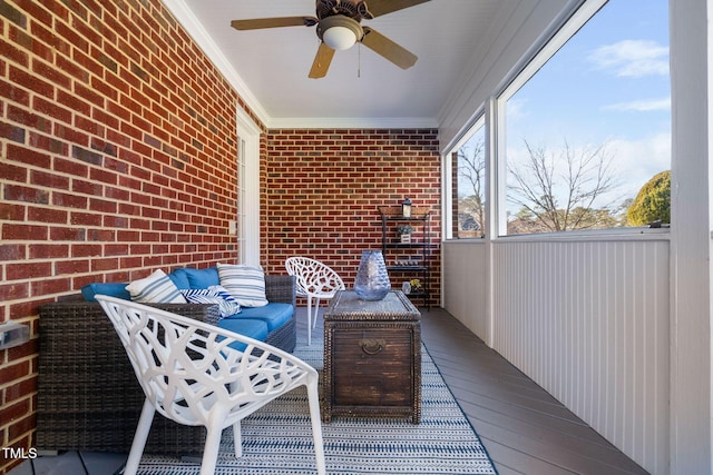 exterior space with a ceiling fan