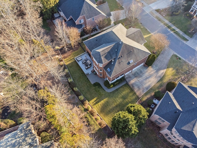 birds eye view of property with a residential view