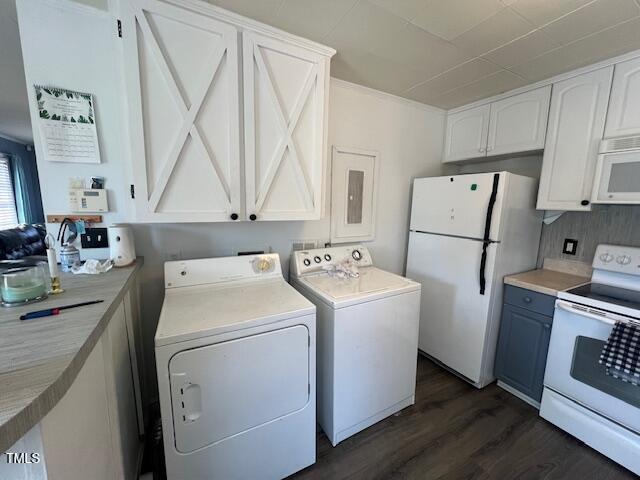 606 N Orange Ave, Dunn, NC 28334 - laundry room with laundry area, dark wood finished floors, and washer and dryer
