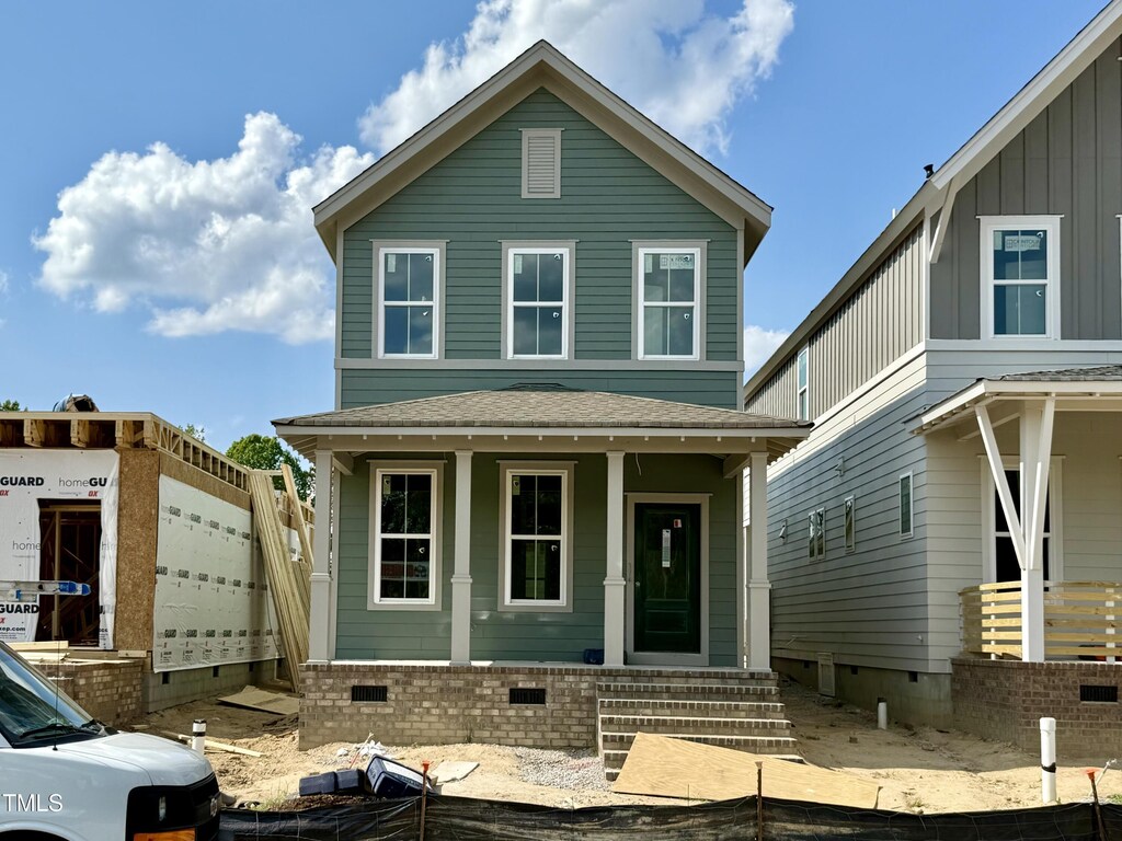 1556 Piney Falls Dr, Wendell, NC 27591 - view of front facade with a porch, crawl space, and roof with shingles