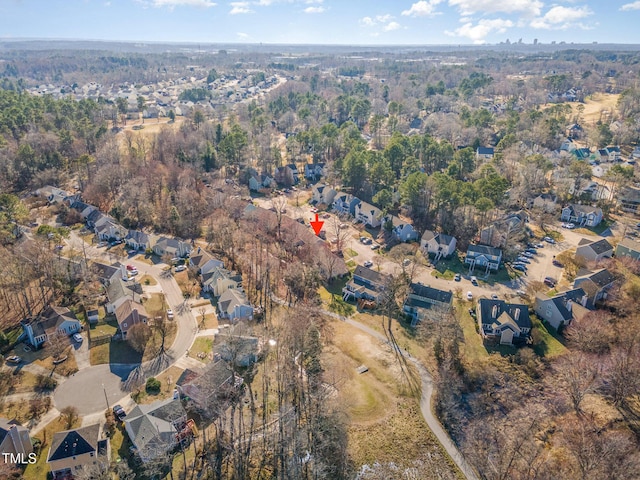 birds eye view of property with a residential view