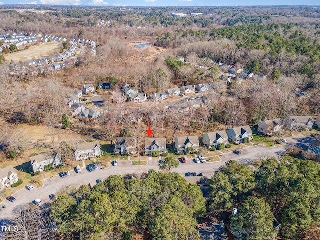 bird's eye view with a residential view and a forest view