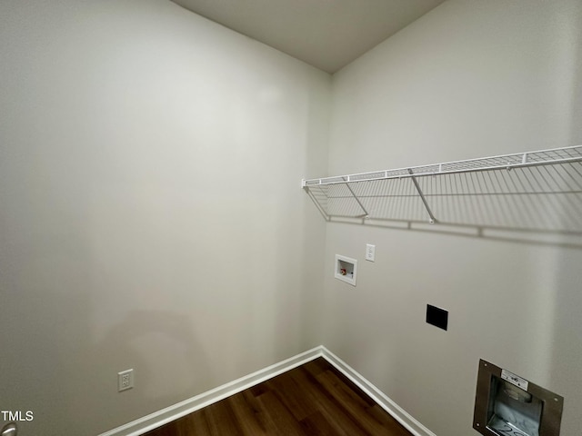 laundry room with laundry area, hookup for a washing machine, baseboards, and dark wood-style flooring