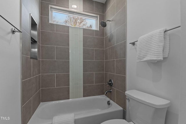 full bath with washtub / shower combination and toilet