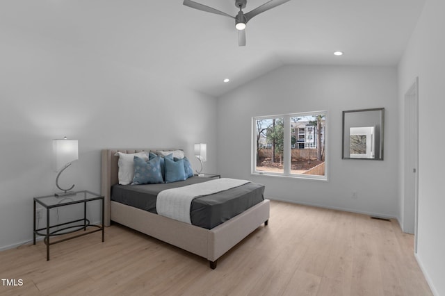 bedroom with lofted ceiling, recessed lighting, light wood-style floors, ceiling fan, and baseboards