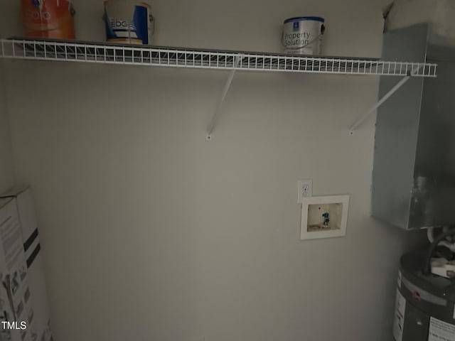 laundry area with water heater, laundry area, and hookup for a washing machine