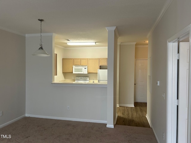 kitchen featuring light brown cabinets, white appliances, light countertops, ornamental molding, and dark colored carpet