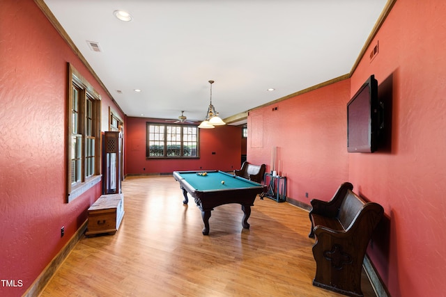 rec room featuring light wood-type flooring, pool table, baseboards, and a textured wall