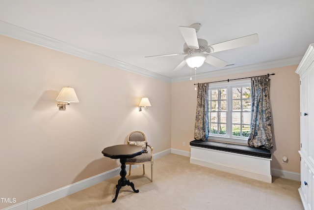 living area featuring light carpet, baseboards, ornamental molding, and ceiling fan