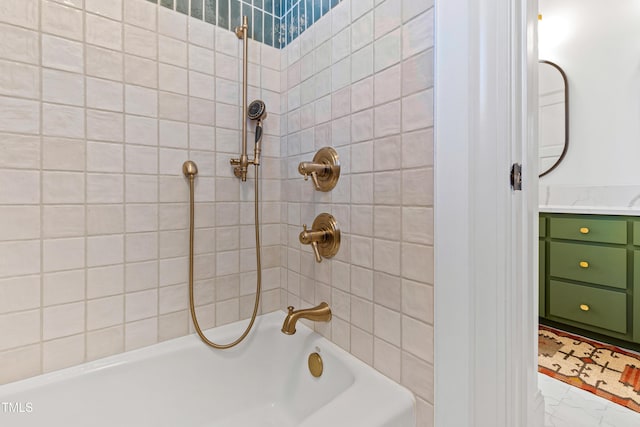 bathroom with shower / washtub combination and vanity