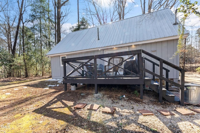 exterior space with metal roof