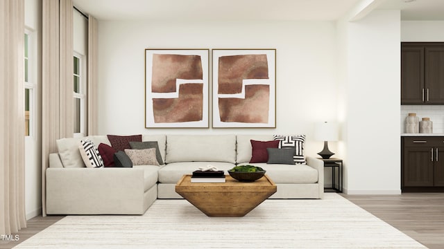 living room featuring light wood-style floors and baseboards