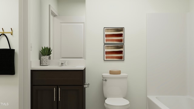 bathroom featuring toilet and vanity