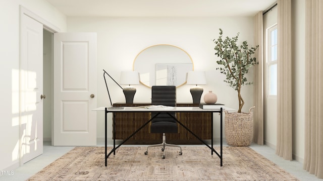 home office featuring carpet and a wealth of natural light