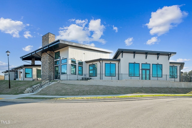 view of building exterior featuring stairway