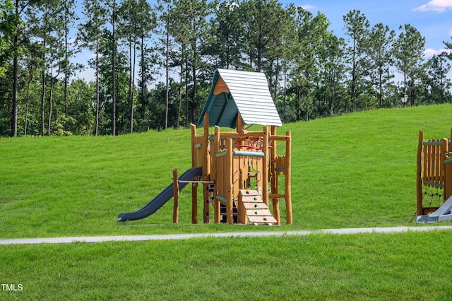 view of jungle gym featuring a yard