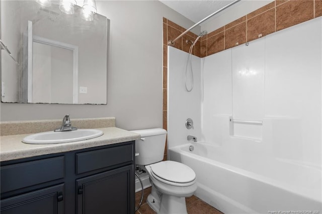 bathroom with shower / bathtub combination, toilet, and vanity