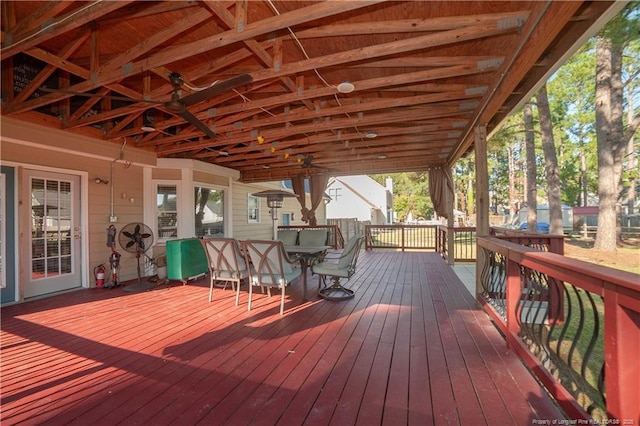 deck featuring outdoor dining area