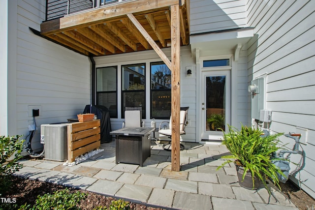 view of patio / terrace with central AC unit