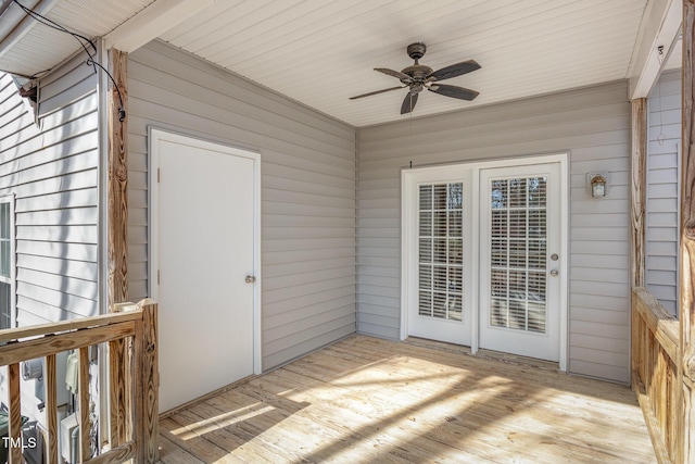 exterior space with ceiling fan