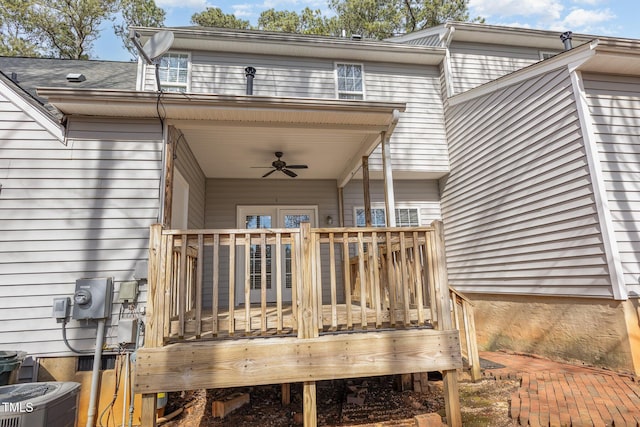 deck featuring ceiling fan and cooling unit