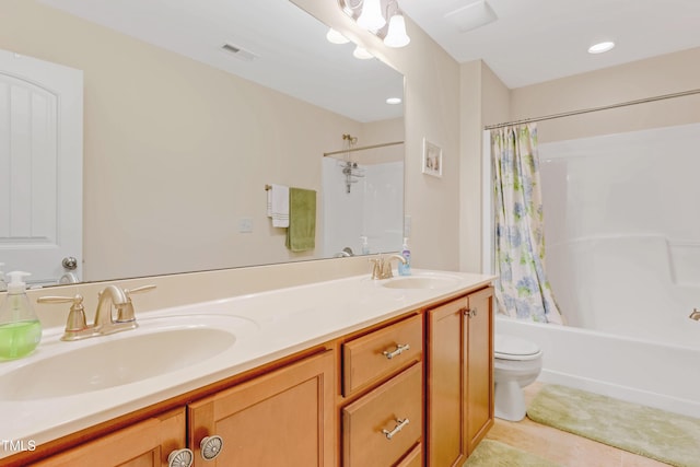 bathroom with shower / tub combo, a sink, toilet, and double vanity