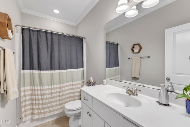 bathroom with toilet, vanity, crown molding, and tile patterned floors