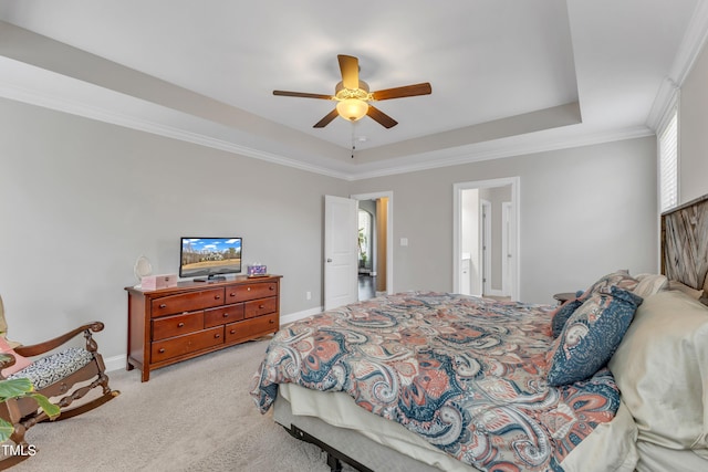 bedroom featuring baseboards, ornamental molding, a raised ceiling, and light colored carpet