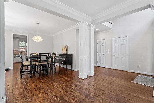 dining space with crown molding, dark wood-style flooring, baseboards, decorative columns, and an inviting chandelier