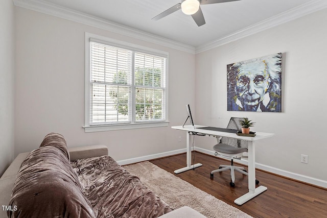 office space with baseboards, ceiling fan, wood finished floors, and crown molding