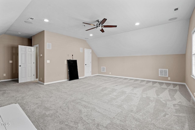 bonus room with vaulted ceiling, carpet, visible vents, and baseboards