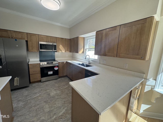 kitchen featuring light stone counters, a peninsula, stainless steel appliances, crown molding, and a sink