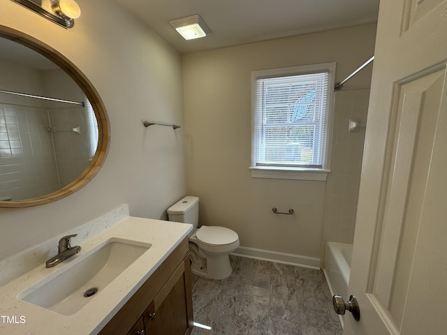 full bathroom with baseboards, vanity, toilet, and shower / bathtub combination