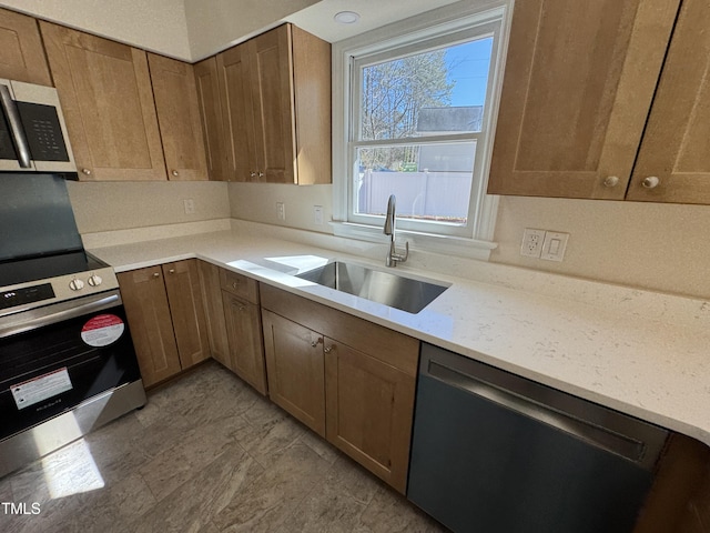 kitchen with stainless steel appliances and a sink