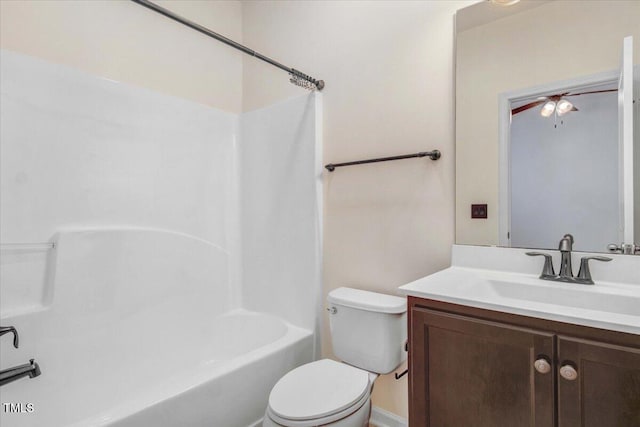 full bath featuring vanity, toilet, and shower / bathtub combination