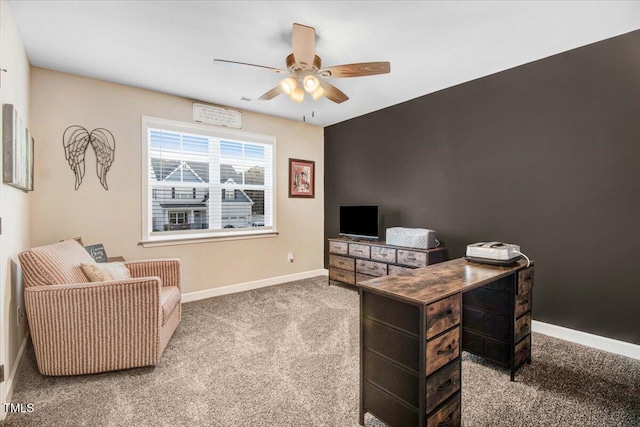 301 Stonebridge Dr, Pikeville, NC 27863 - home office featuring a ceiling fan, light carpet, and baseboards