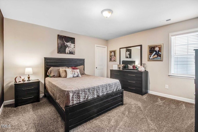 301 Stonebridge Dr, Pikeville, NC 27863 - carpeted bedroom featuring visible vents and baseboards