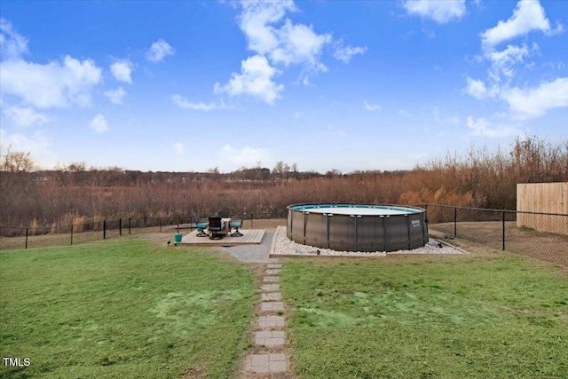 301 Stonebridge Dr, Pikeville, NC 27863 - view of yard with a fenced in pool and a fenced backyard